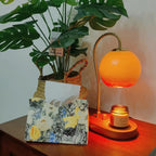 Orangefarbene Retro-Kerzenwärmerlampe im Bauhaus-Stil
